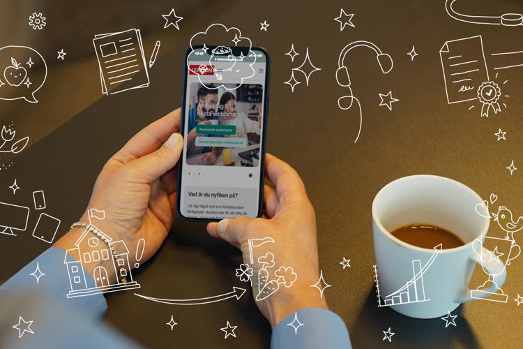 mobil visar med Lexicon 365 med kaffekopp bredvid